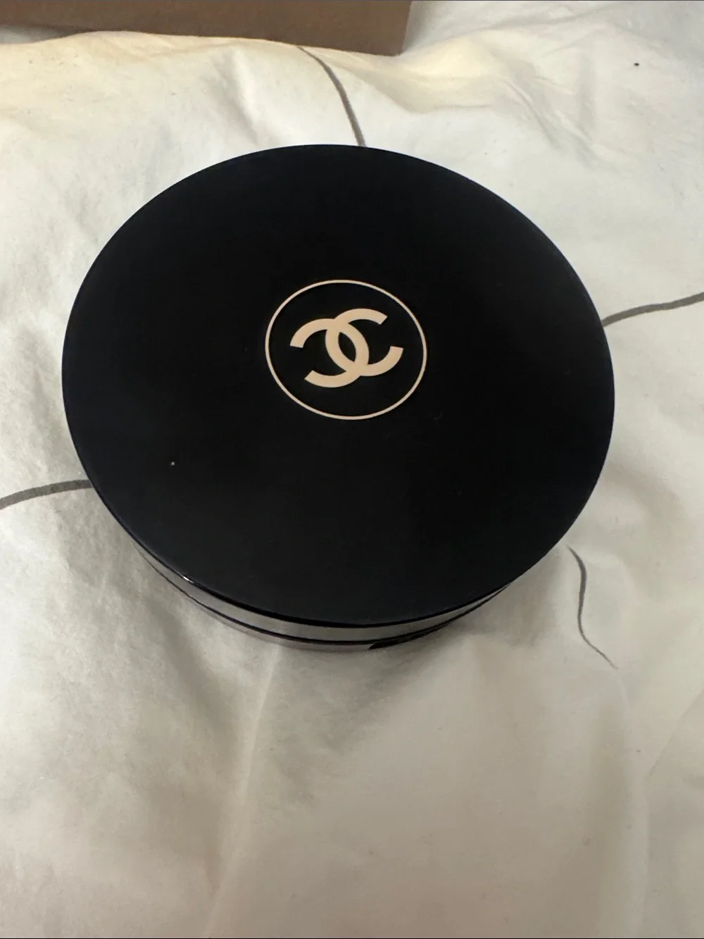 CHANEL Black Round Compact with Gold Interlocking CC
